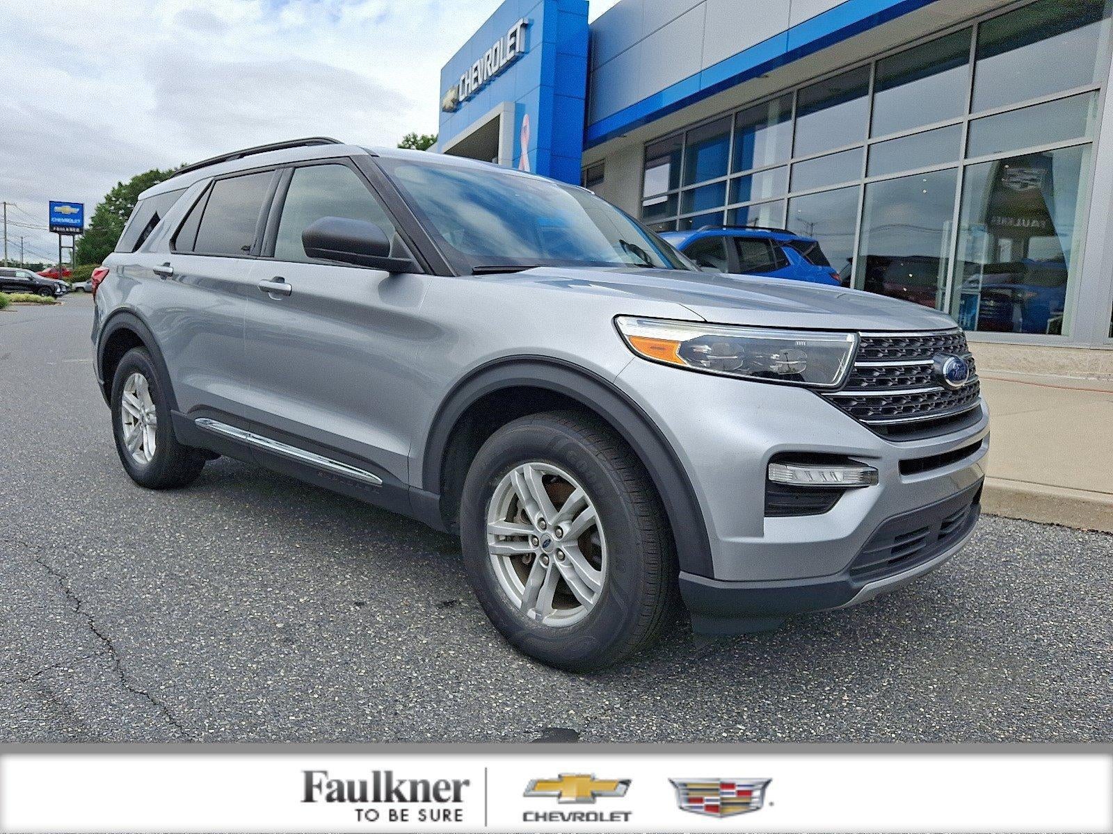2020 Ford Explorer XLT in Iconic Silver Metallic — front three-quarter view