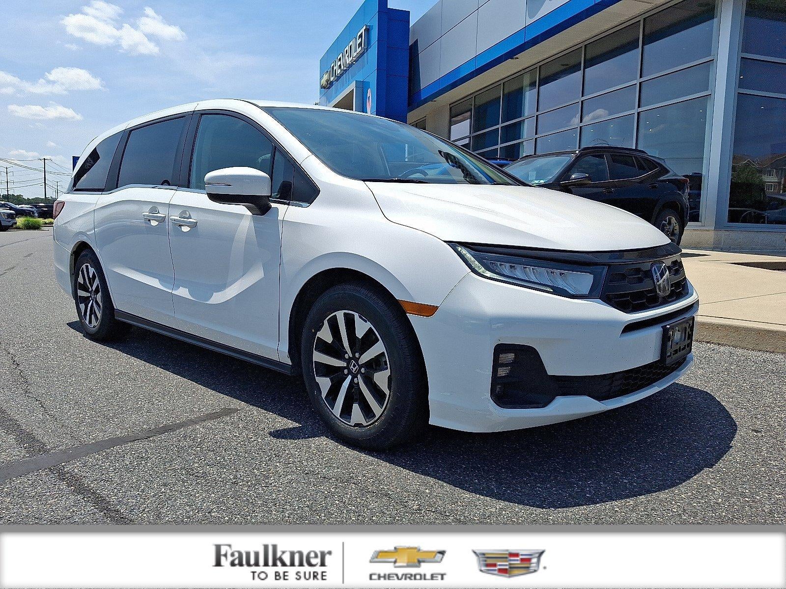 2025 Honda Odyssey EX-L in Solar Silver Metallic — front three-quarter view