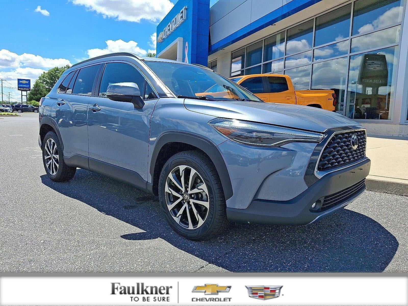 2024 Toyota Corolla Cross XLE in Celestite 1K3 — front three-quarter view