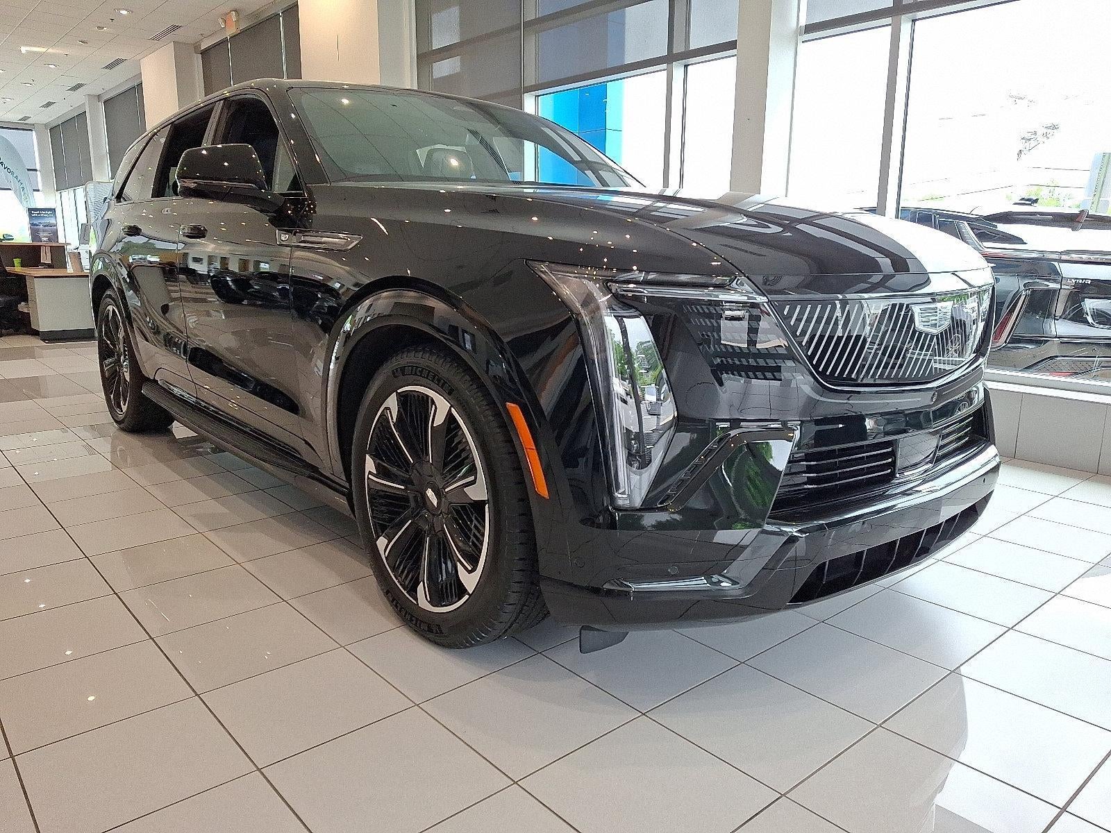 2025 Cadillac ESCALADE IQ AWD Sport 2 in Black Raven — front three-quarter view