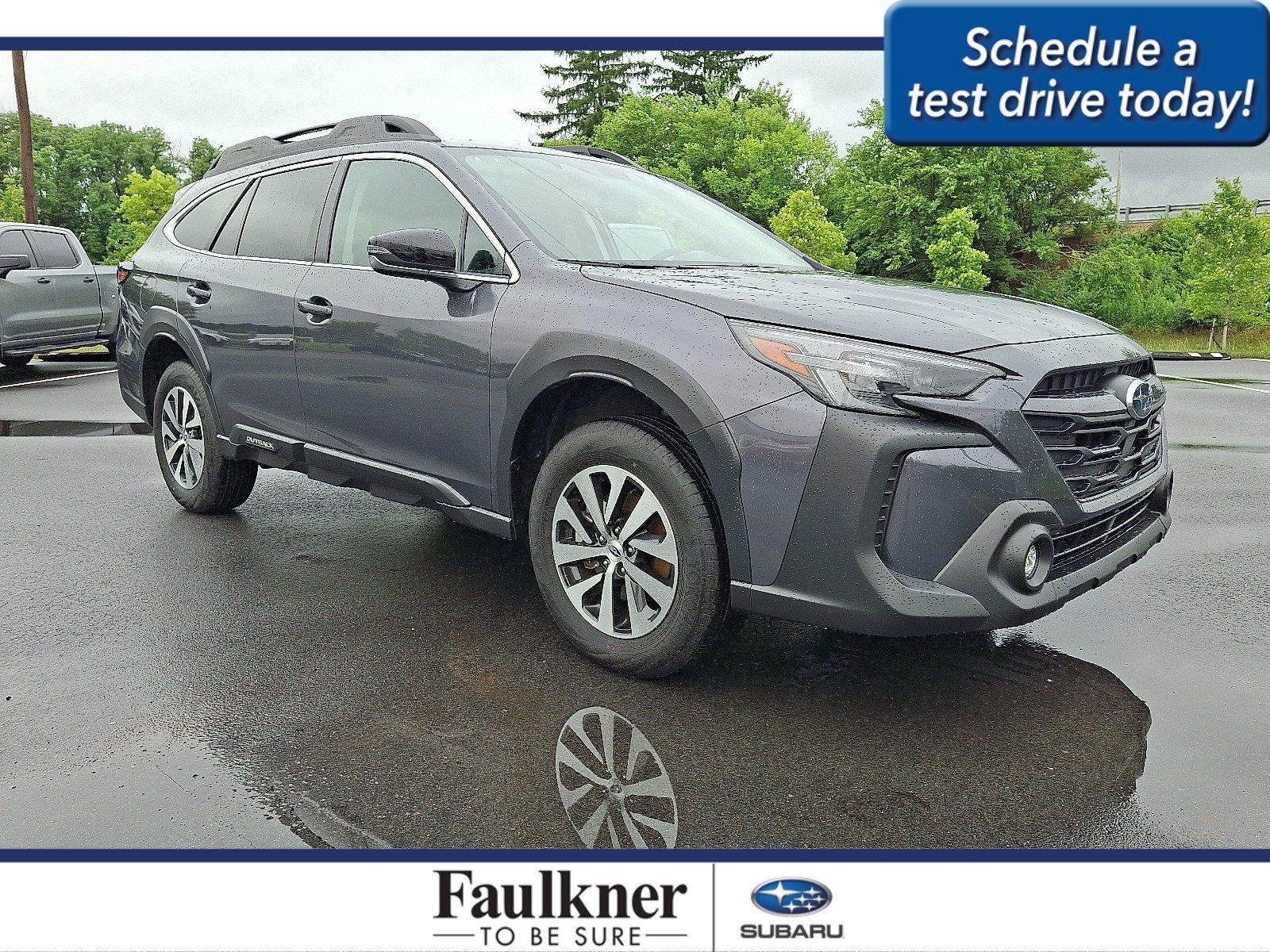 2025 Subaru Outback Premium AWD in Magnetite Gray Metallic — front three-quarter view