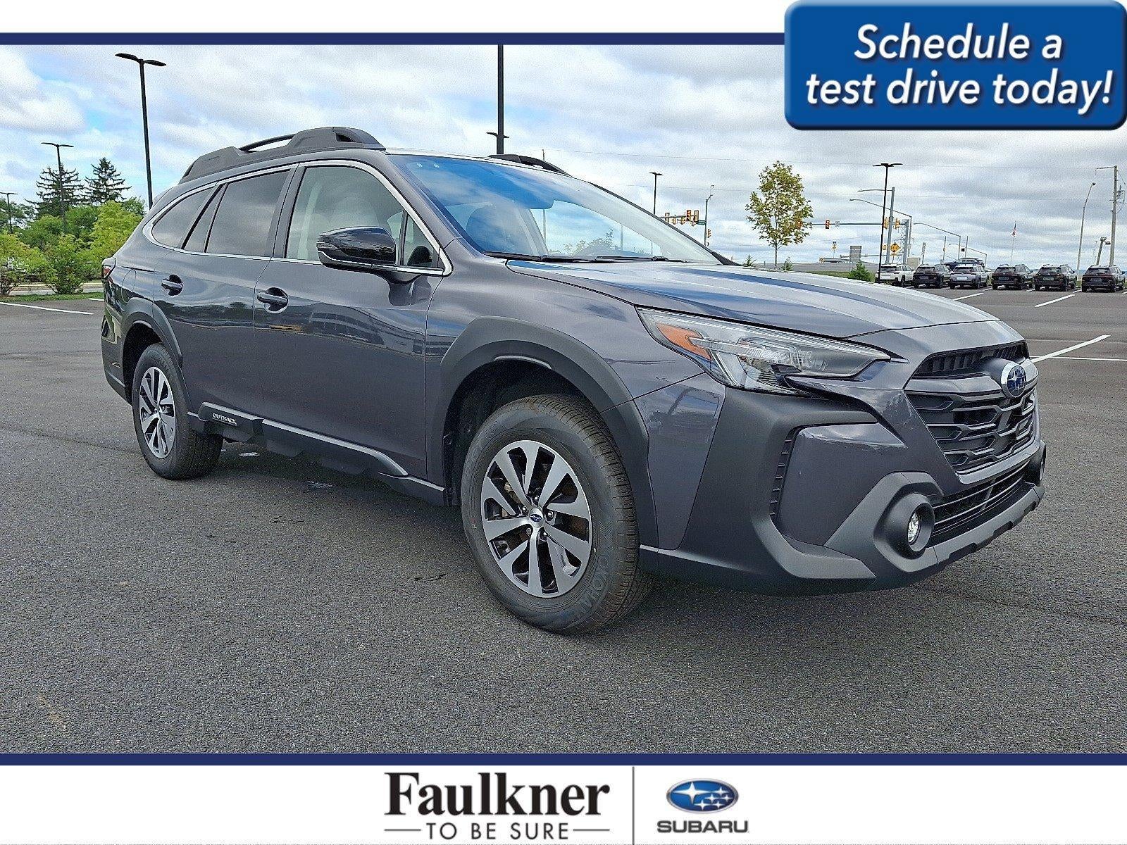 2025 Subaru Outback Premium AWD in Magnetite Gray Metallic — front three-quarter view