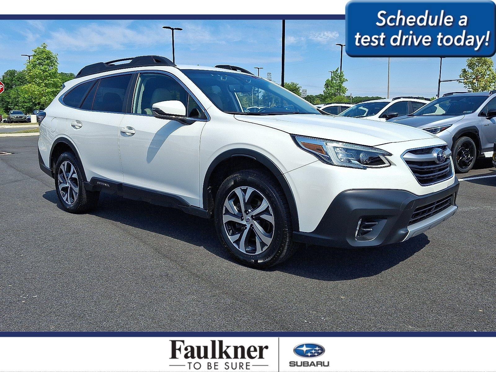 2021 Subaru Outback Limited CVT in Crystal White Pearl — front three-quarter view