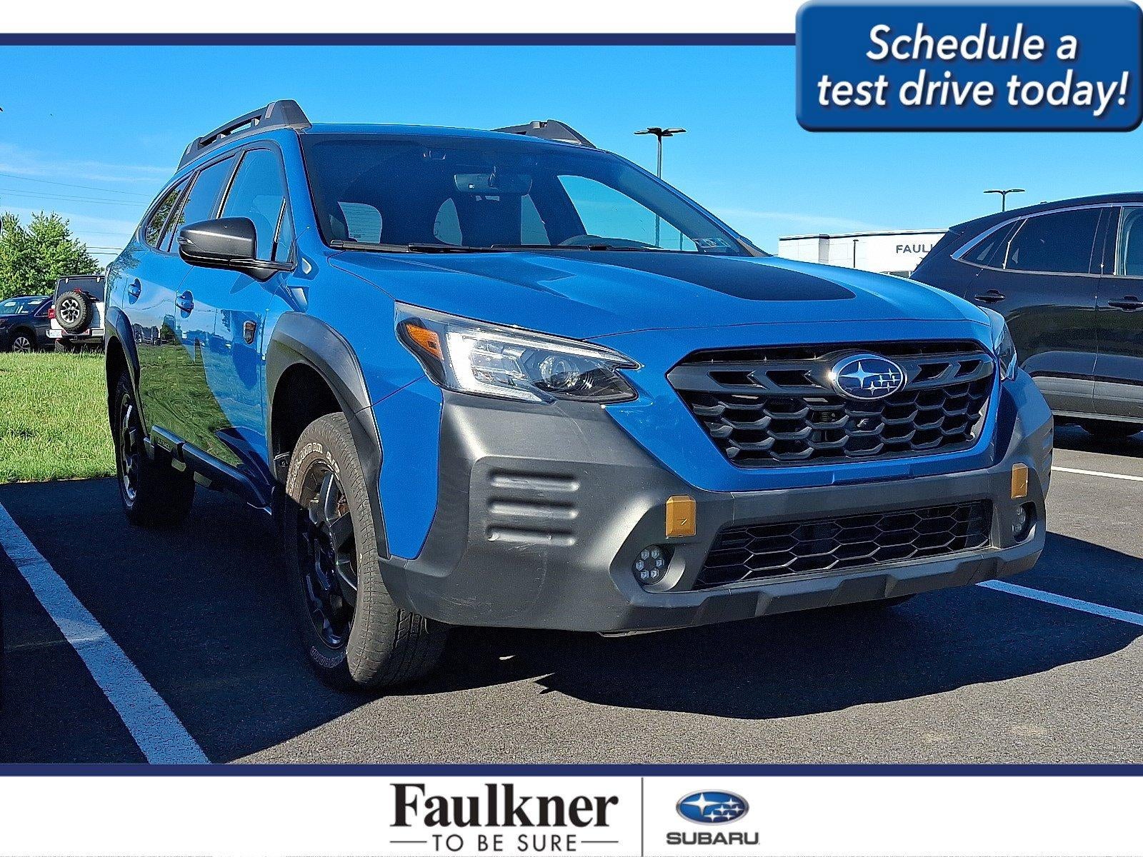 2022 Subaru Outback Wilderness CVT in Geyser Blue — front three-quarter view