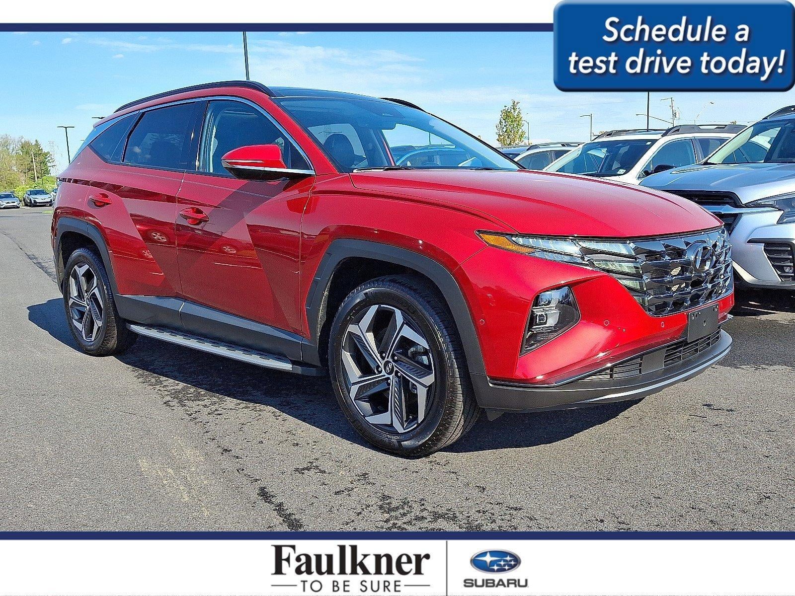 2023 Hyundai TUCSON Limited AWD in Calypso Red — front three-quarter view