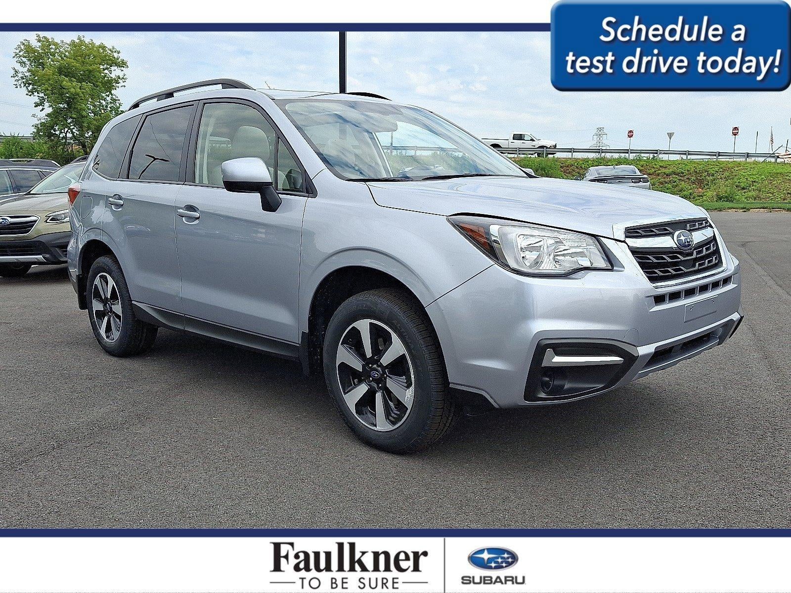 2018 Subaru Forester 2.5i Premium CVT in Ice Silver Metallic — front three-quarter view