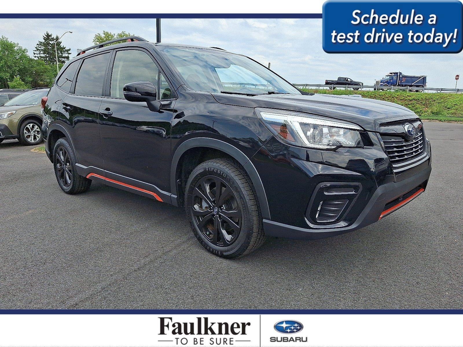 2019 Subaru Forester 2.5i Sport in Crystal Black Silica — front three-quarter view