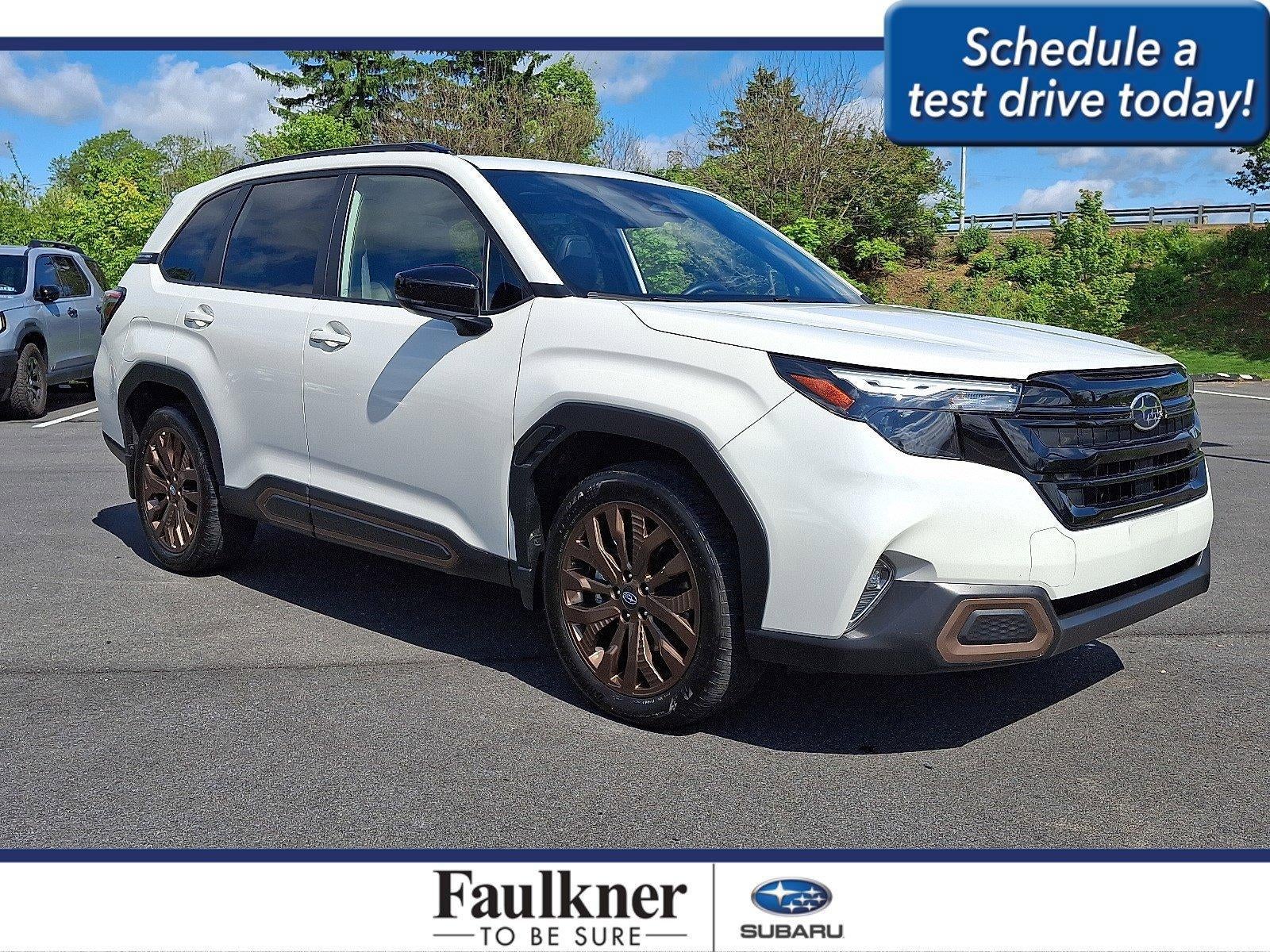 2025 Subaru Forester Sport AWD in Crystal White Pearl — front three-quarter view