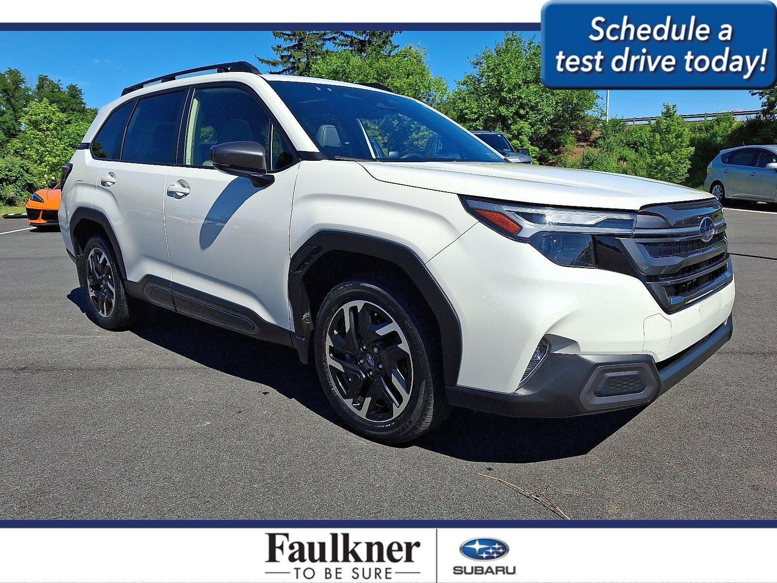 2025 Subaru Forester Limited AWD in Crystal White Pearl — front three-quarter view