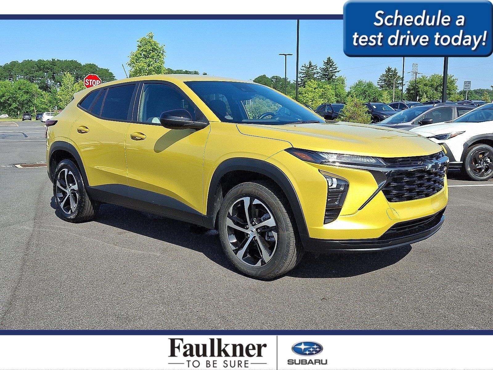 2024 Chevrolet Trax FWD 4dr 1RS in Nitro Yellow Metallic — front three-quarter view