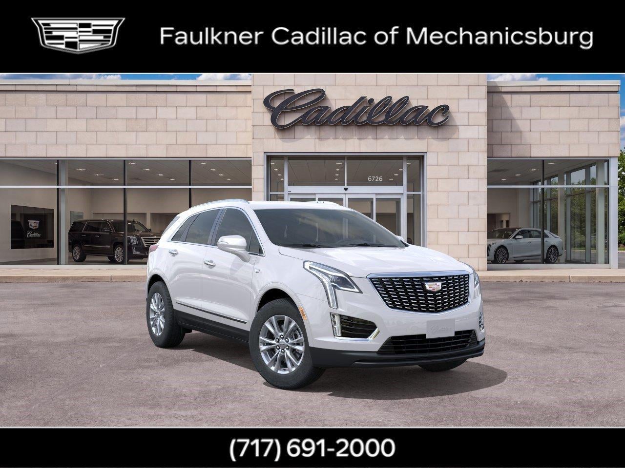 2026 Cadillac XT5 Luxury in Crystal White Tricoat — front three-quarter view