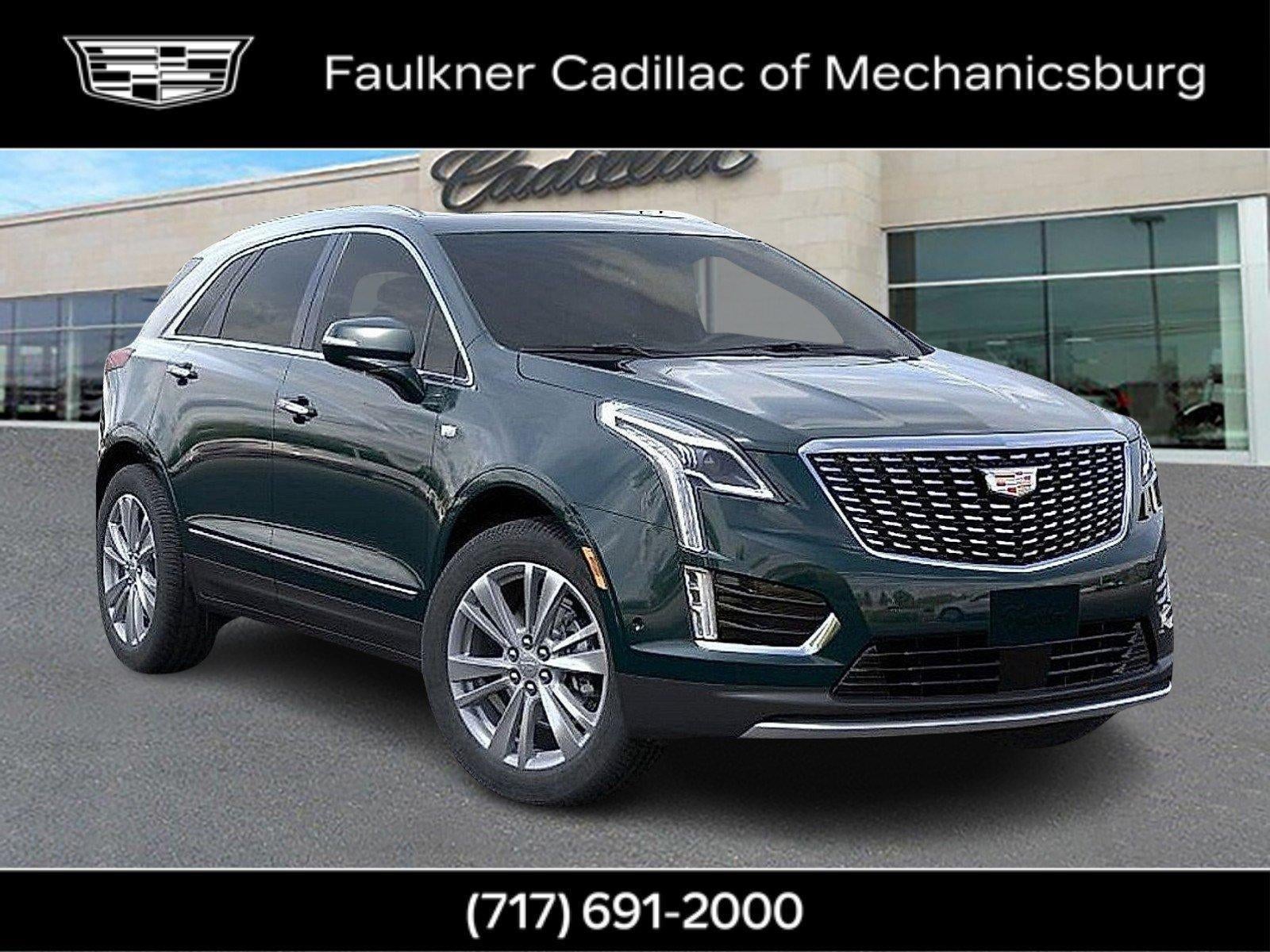 2026 Cadillac XT5 Premium Luxury in Emerald Lake Metallic — front three-quarter view