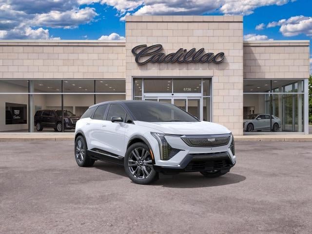 2026 Cadillac OPTIQ Premium Sport in Vibrant White Tricoat — front three-quarter view